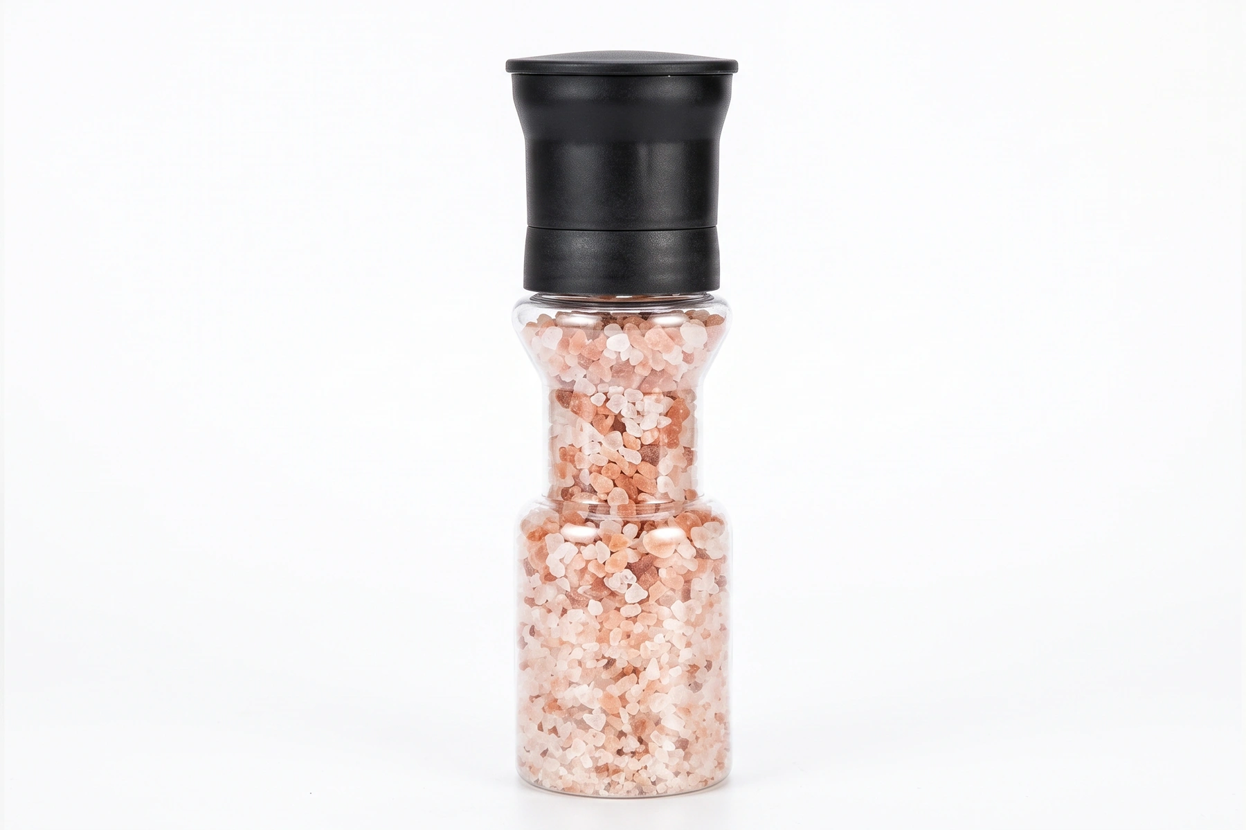 Clear spice grinder jar filled with pink salt and fitted with a black grinder head